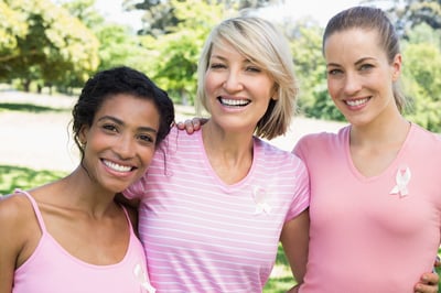 women hugging - breast cancer awareness