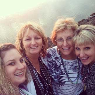 Mary (2nd from right) on a beach trip with her girls last year