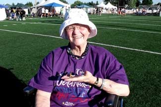 A butterfly lands on Barbara's hand during 2011 Relay For Life