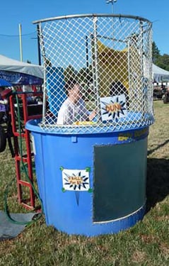 Dr. Benjamin Cho in the Dunk-a-Doc tank